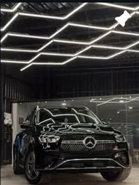 Black luxury car in detailing studio